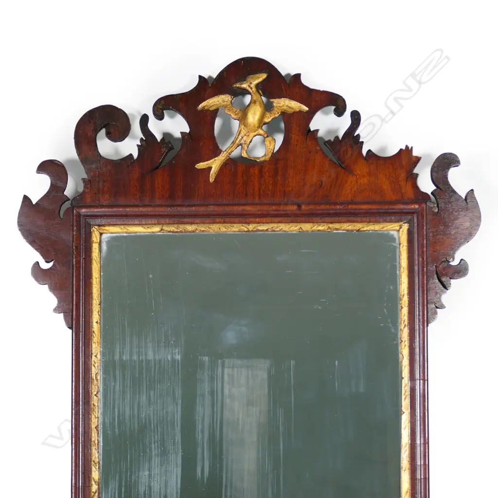 A George III period, mahogany and parcel gilt, fretwork framed wall mirror. Image 1++
