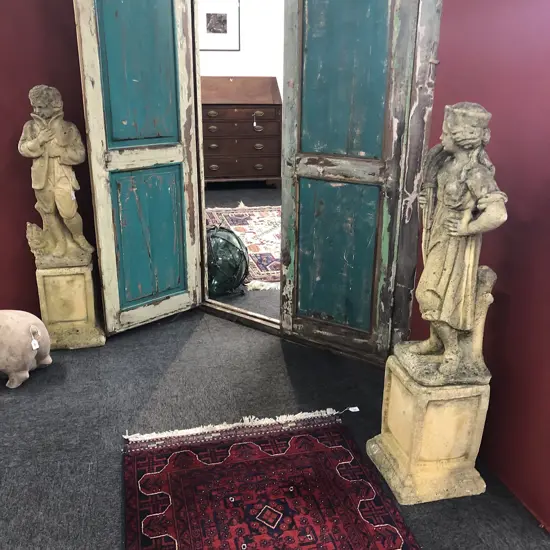 A pair of Church Stone garden statues,