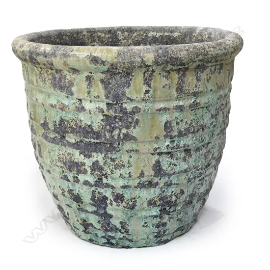 A large pottery garden pot,
