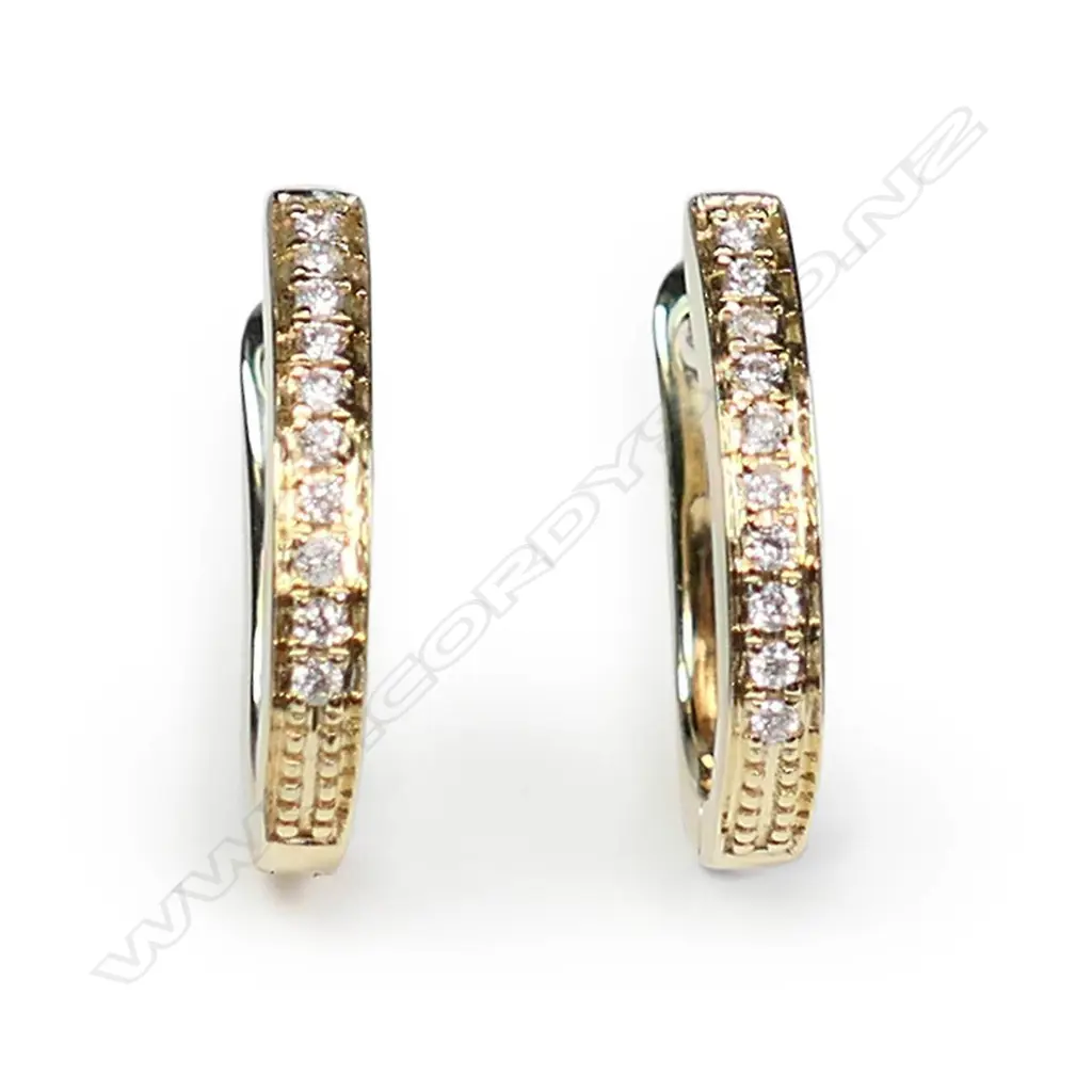 A pair of 9ct yellow gold and diamond hoop earrings Image 1++