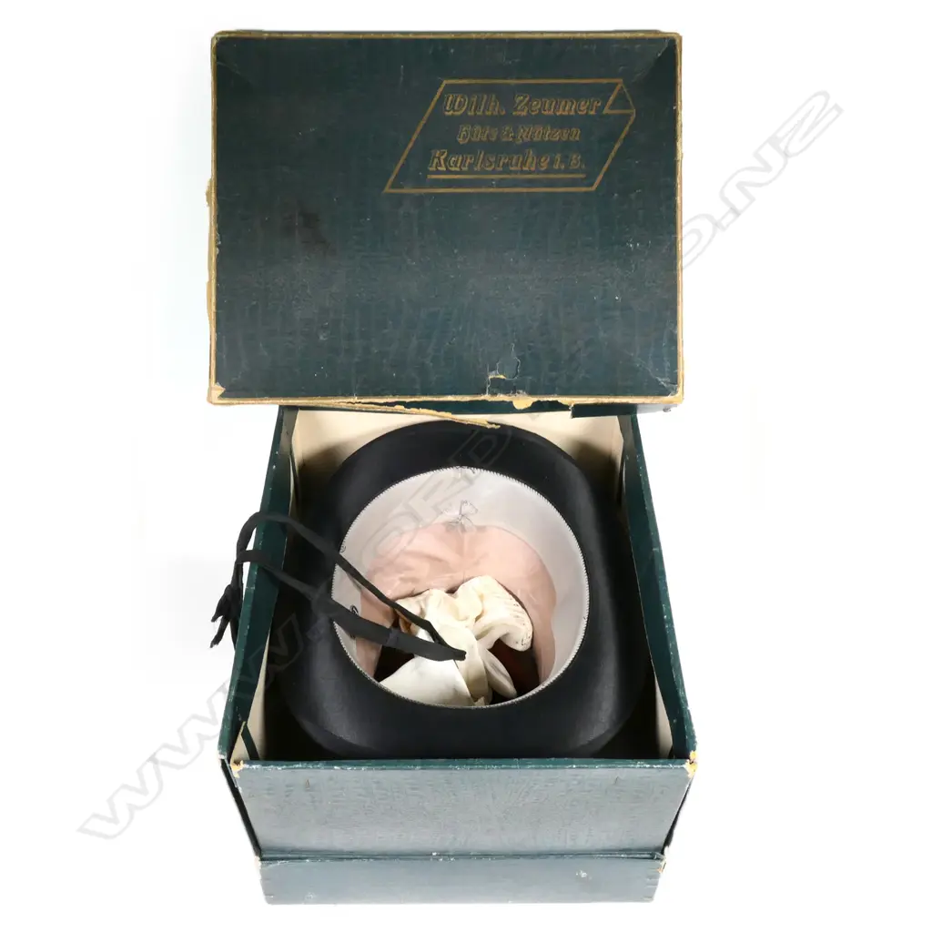 An antique silk top hat Image 1++