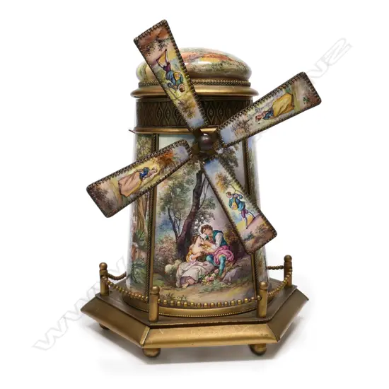 An early 20thc Austrian gilt metal and enamel windmill jewellery music box,