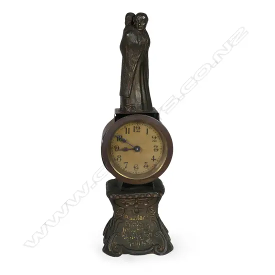A rare early 20thC bronzed spelter Māori figured Auckland Exhibition clock,
