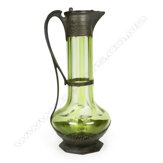 An early 1900s Orivit pewter and glass claret jug,