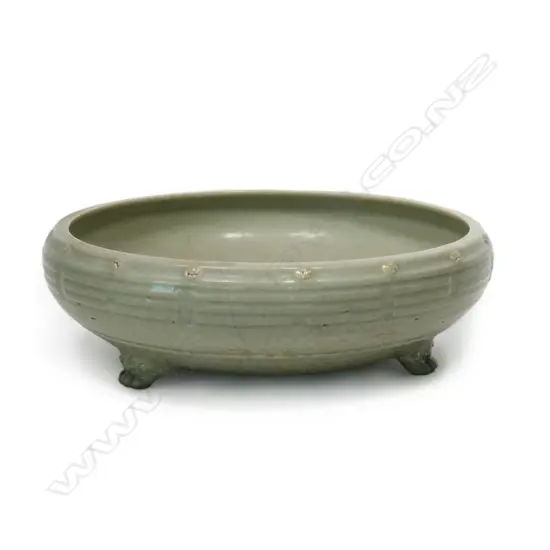 A Ming Dynasty Longquan celadon tripod censer