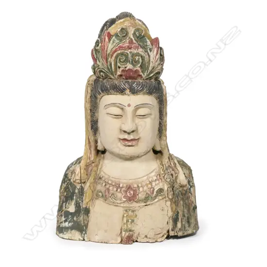 A carved and painted Chinese wooden bust of Kuanyin