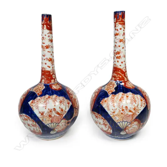 A pair of Japanese Imari bottle vases,