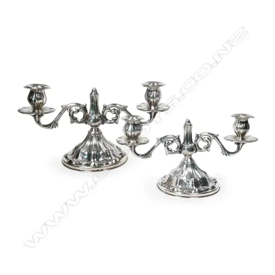 A pair of Italian 800 silver candelabra,