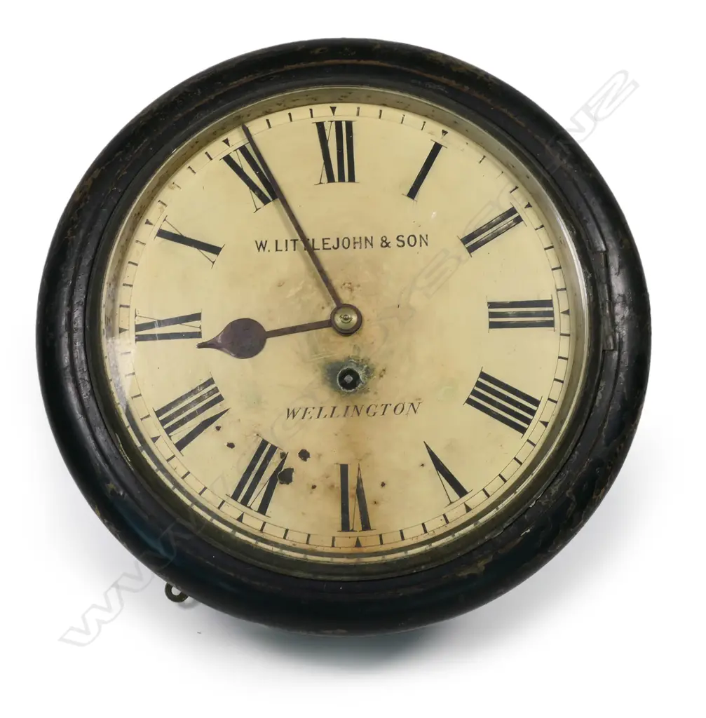 A Victorian ebonised circular cased fusee drive wall clock Image 1++