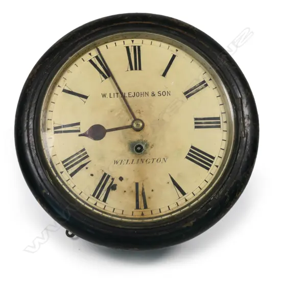 A Victorian ebonised circular cased fusee drive wall clock