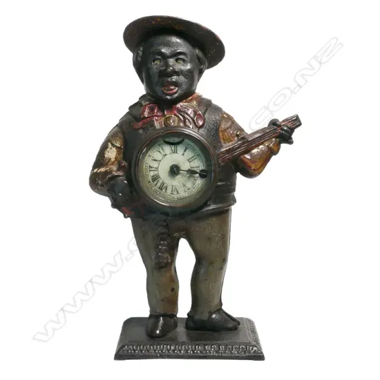 An uncommon 19thC American Waterbury Banjo Player Blinking Eye clock, Connecticut, c.1875,