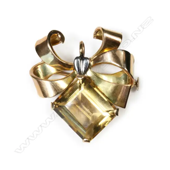 A retro 9ct rose gold and citrine brooch,