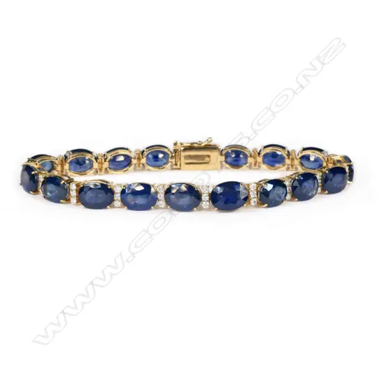 A 14ct gold sapphire and diamond tennis bracelet,