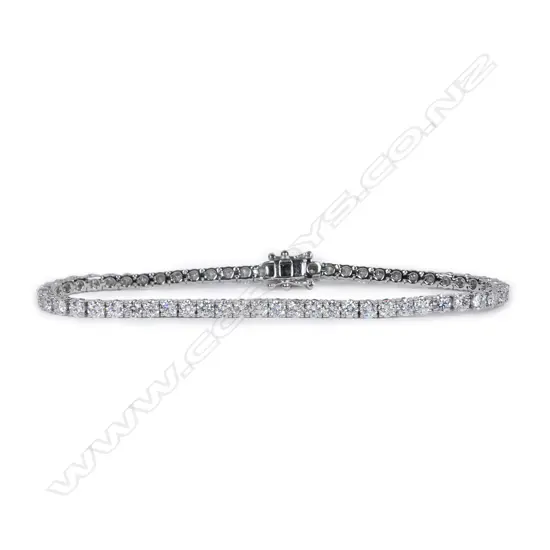 An 18ct white gold and diamond tennis bracelet,