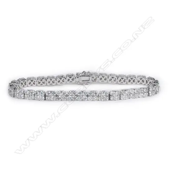 An 18ct white gold and diamond tennis bracelet,