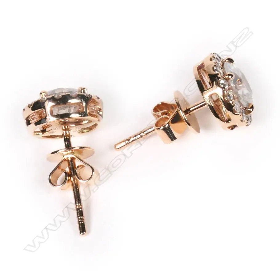 A pair of 14ct rose gold and diamond halo stud earrings, Image 1++
