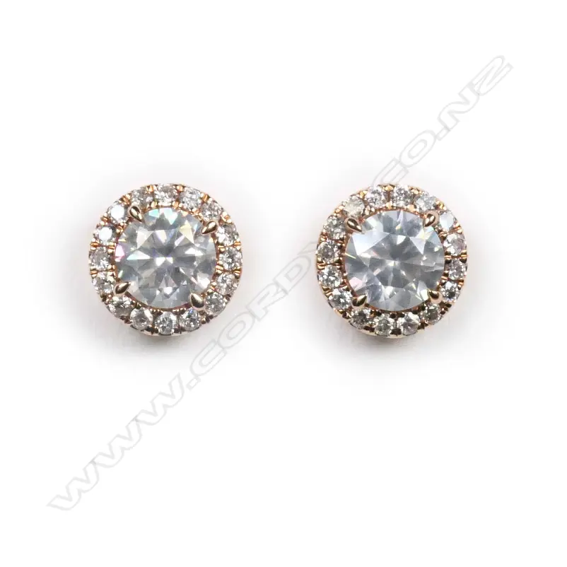 A pair of 14ct rose gold and diamond halo stud earrings, Image 1++