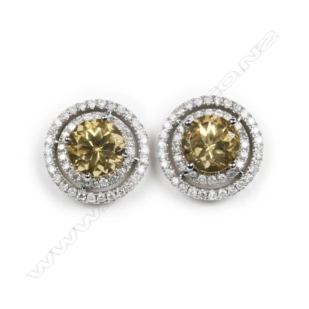 A pair of 14ct white gold, heliodor and diamond double halo earrings, Image 1++
