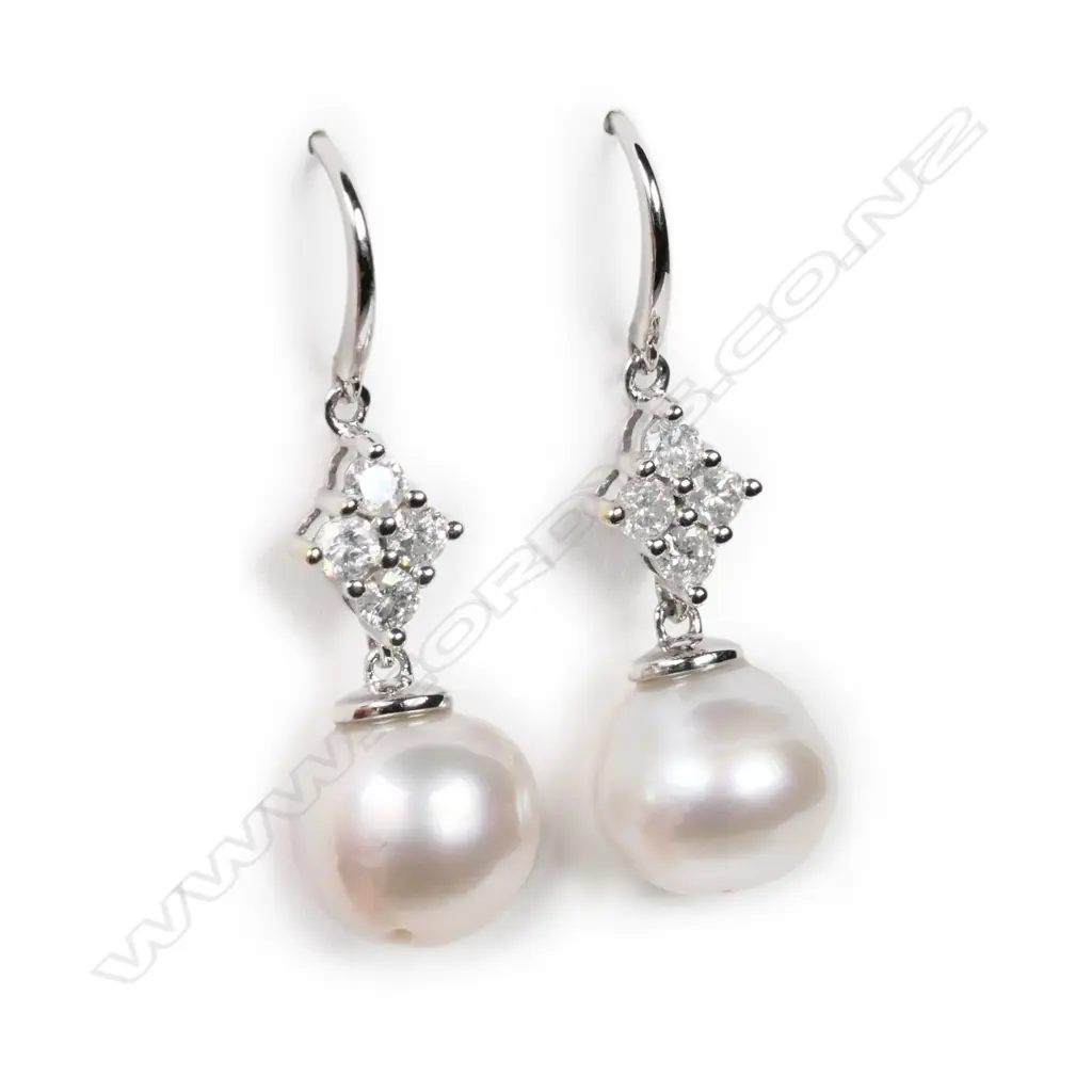 A pair of 14ct white gold South Sea cultured pearl and diamond drop earrings, Image 1++
