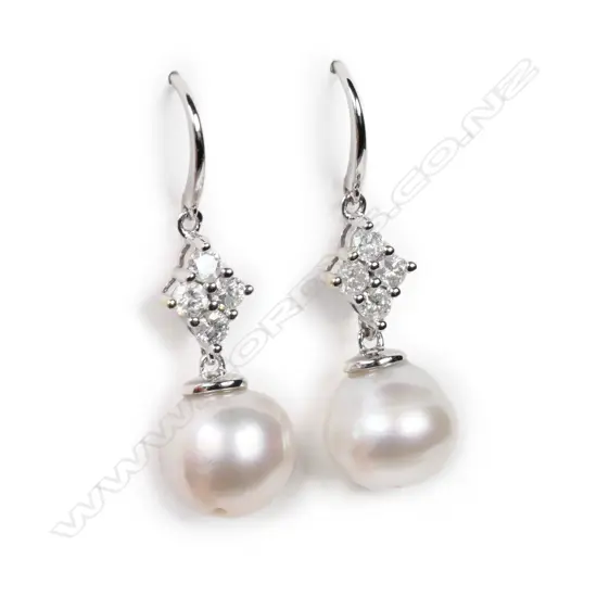 A pair of 14ct white gold South Sea cultured pearl and diamond drop earrings,