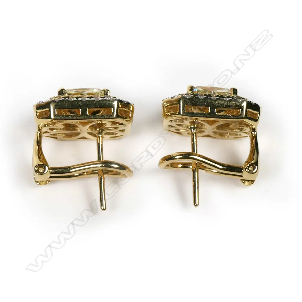 A pair of 18ct gold and diamond earrings, Image 1++