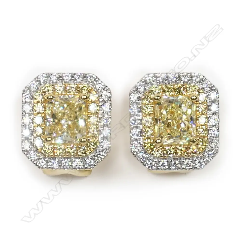 A pair of 18ct gold and diamond earrings, Image 1++