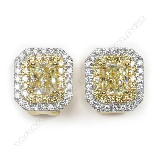 A pair of 18ct gold and diamond earrings,