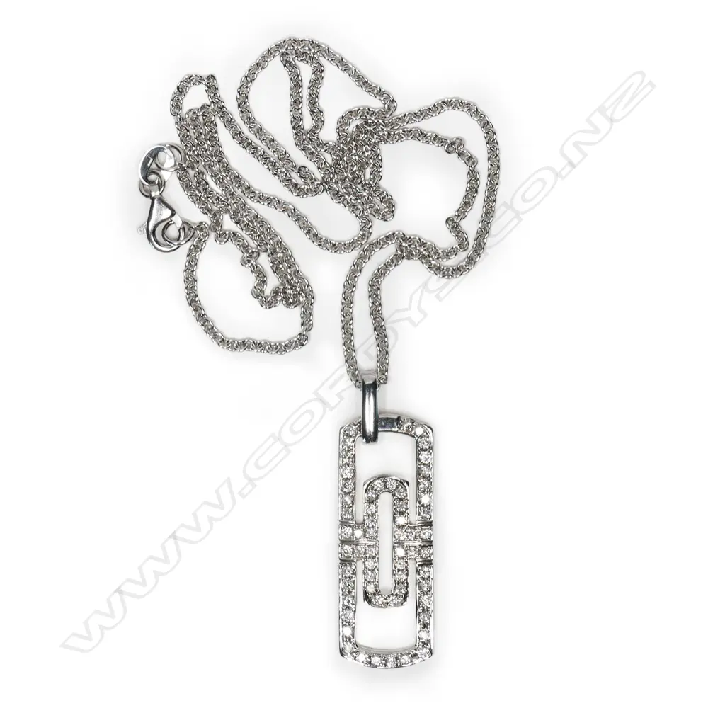 An 18ct white gold and diamond pendant on chain, Image 1++