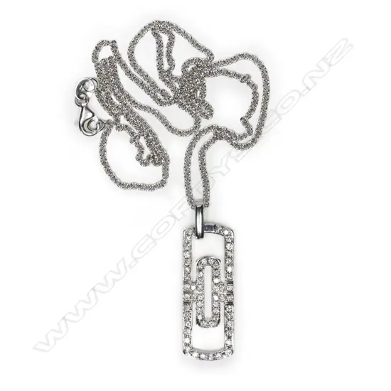 An 18ct white gold and diamond pendant on chain,