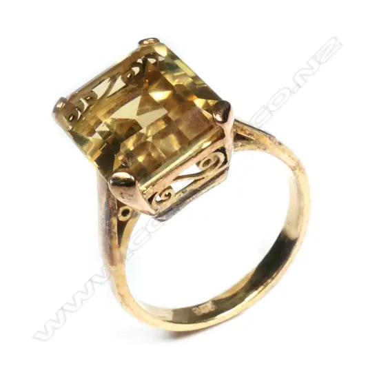 A vintage 9ct yellow gold and large citrine dress ring,