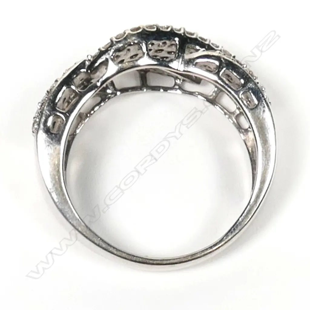An 18ct white gold and multi diamond dress ring, Image 1++
