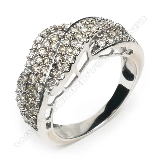 An 18ct white gold and multi diamond dress ring,