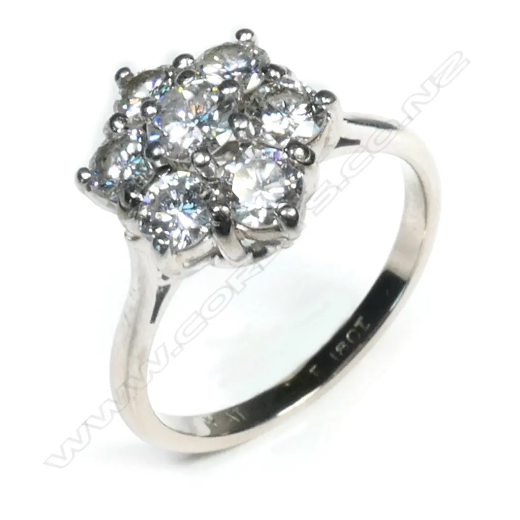 An 18ct white gold and diamond cluster ring, Image 1++