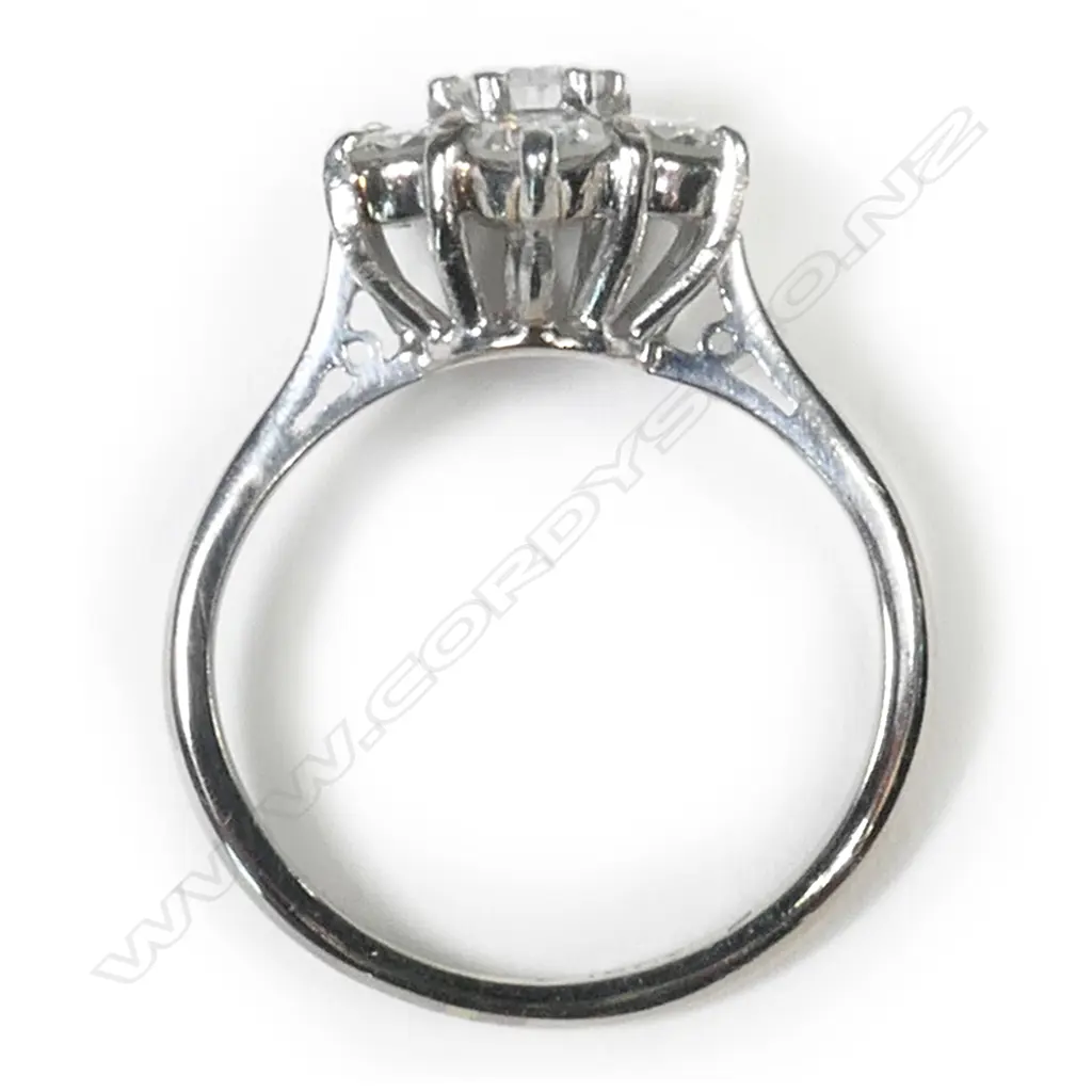 An 18ct white gold and diamond cluster ring, Image 1++