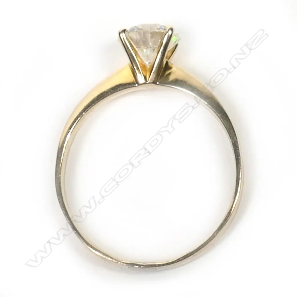 An 18ct gold and diamond solitaire ring, Image 1++