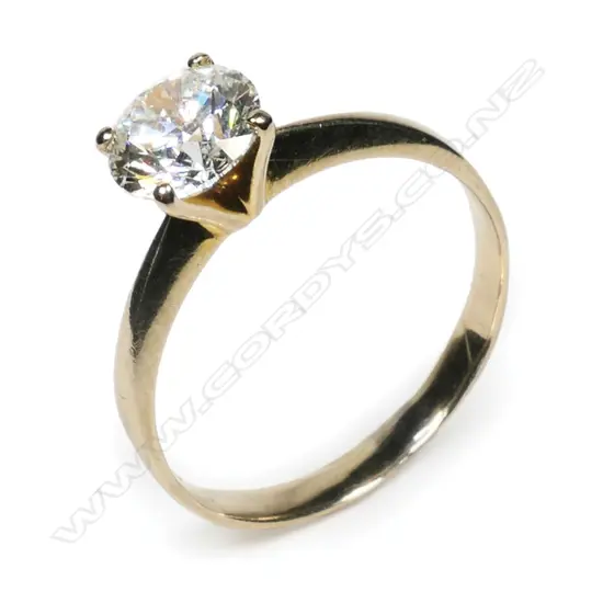 An 18ct gold and diamond solitaire ring,