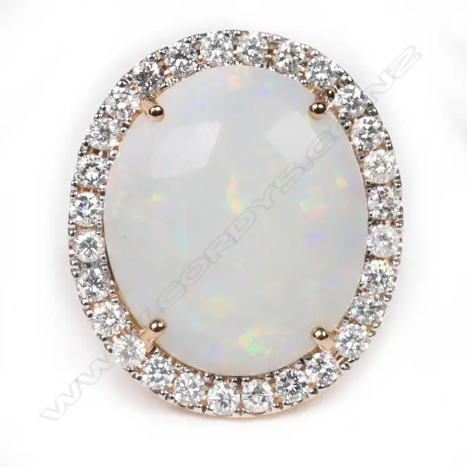 A 14ct rose gold, opal and diamond halo cocktail ring, Image 1++