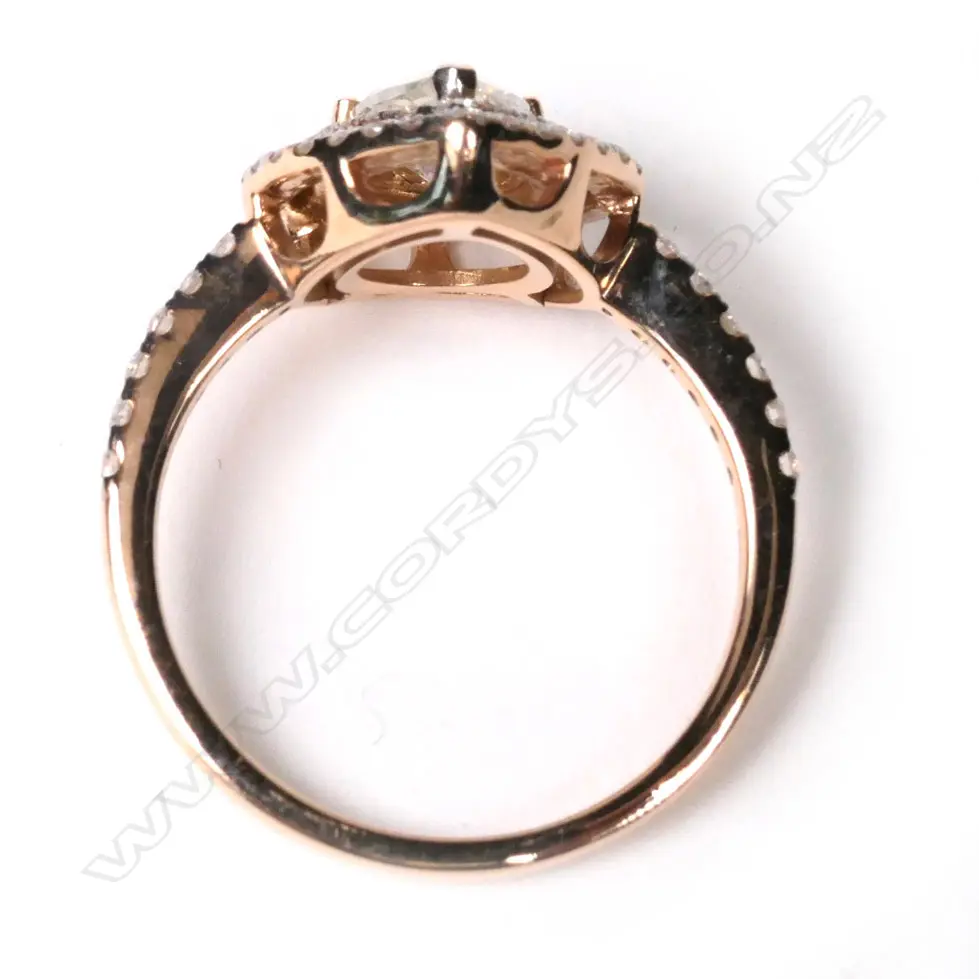A 14ct rose gold and diamond double halo ring, Image 1++