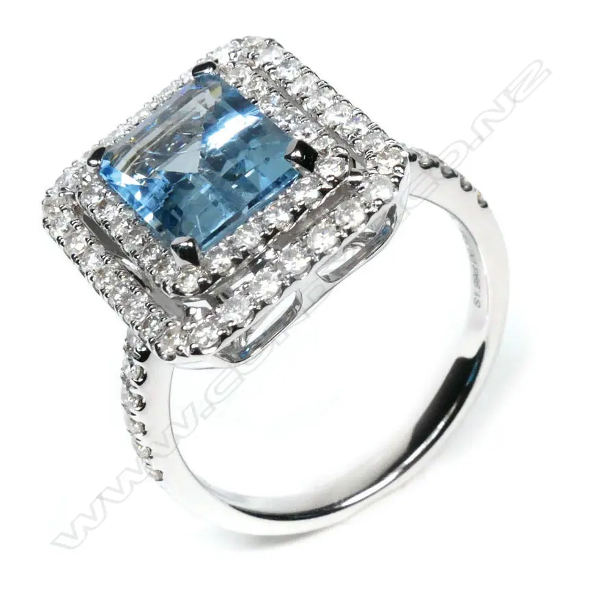 A 14ct white gold aquamarine and diamond, double halo ring, Image 1++
