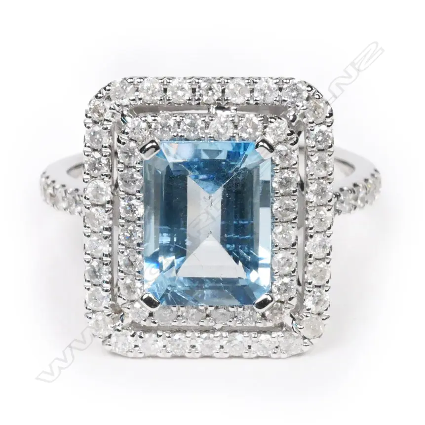 A 14ct white gold aquamarine and diamond, double halo ring, Image 1++