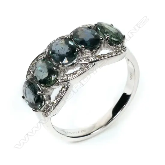 A 14ct white gold Ceylon sapphire and diamond ring,