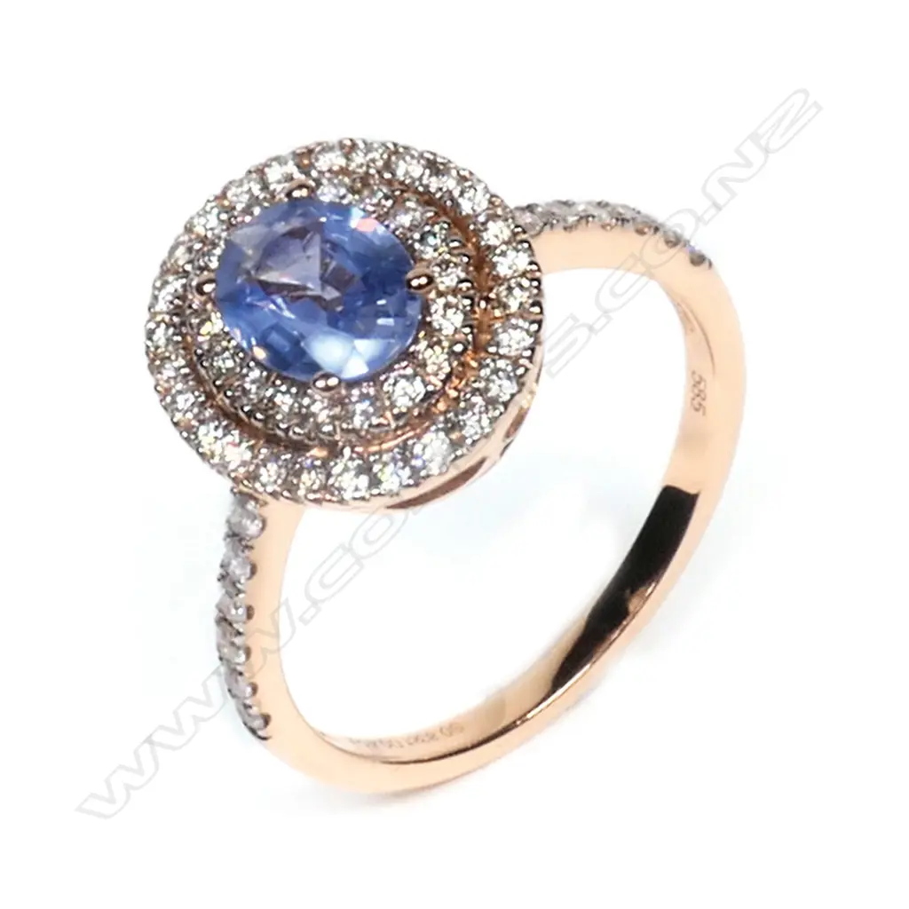 A 14ct rose gold, Ceylon sapphire and diamond double halo ring, Image 1++