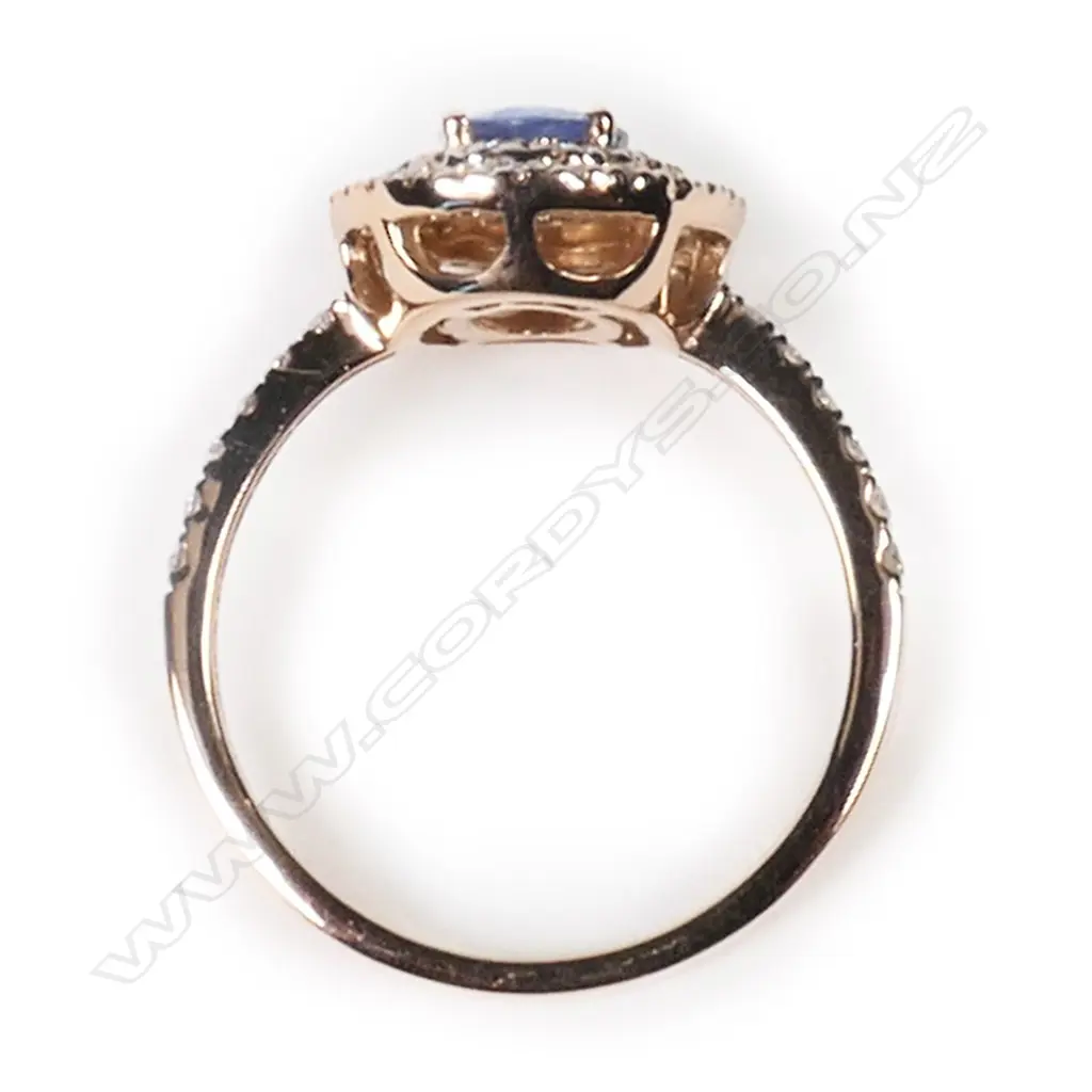 A 14ct rose gold, Ceylon sapphire and diamond double halo ring, Image 1++