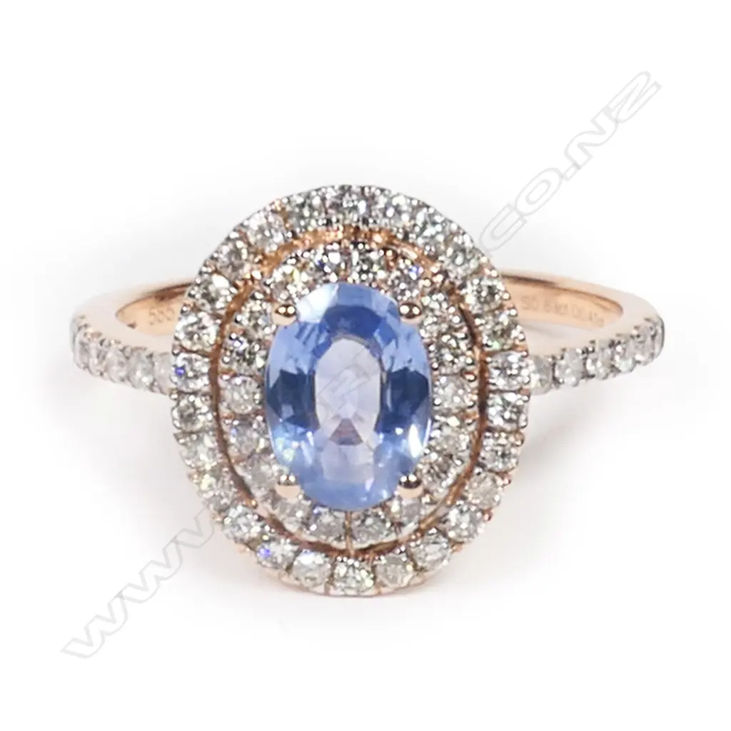 A 14ct rose gold, Ceylon sapphire and diamond double halo ring, Image 1++