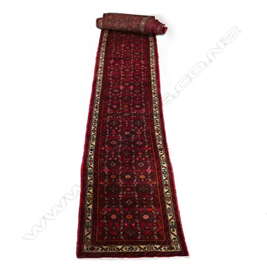 A hand knotted Persian Hosseinabad runner,