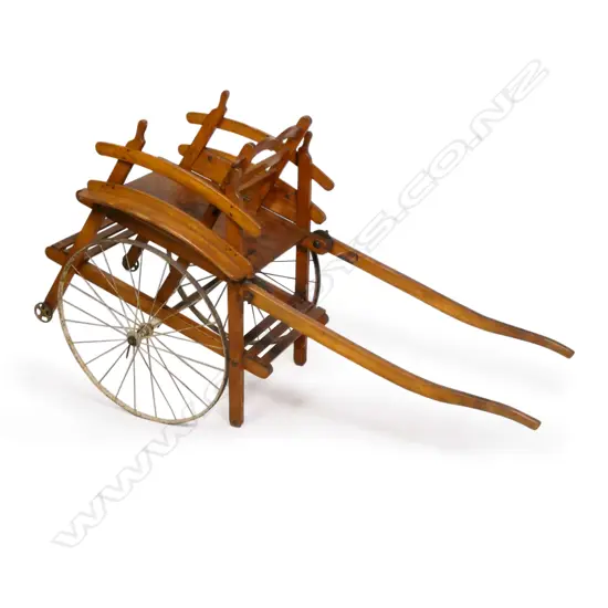An antique French child's dog cart,