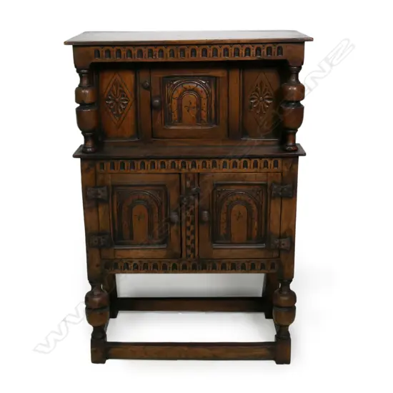 An oak Jacobean style court cupboard,