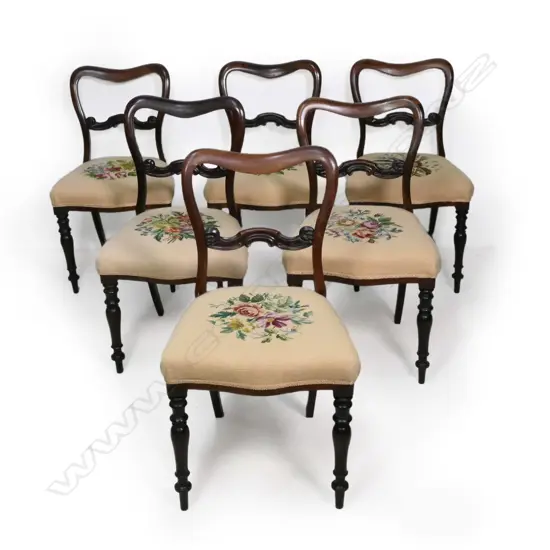 A set of six Victorian saddle back dining chairs,
