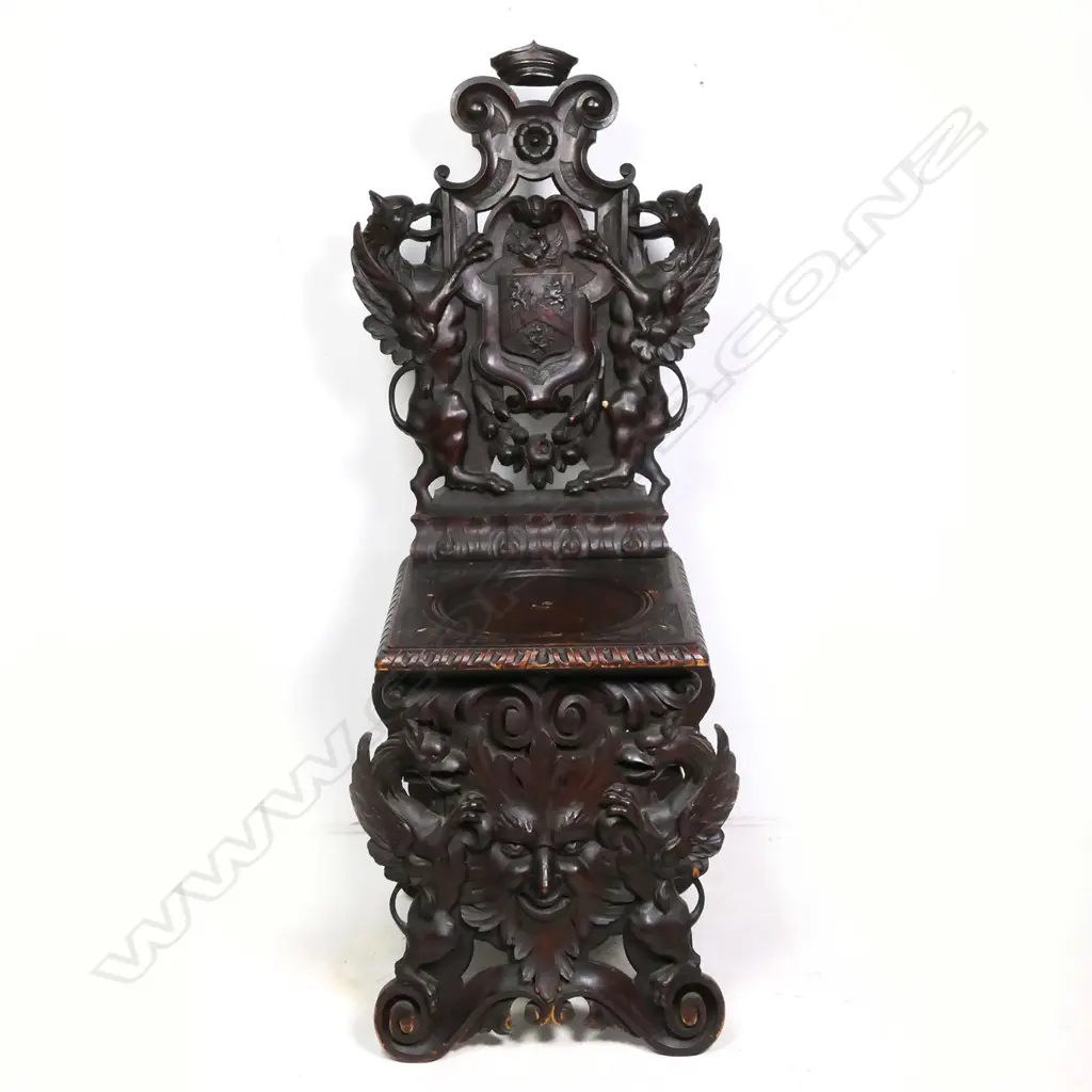 A late 19thC walnut Black Forest carved hall chair, Image 1++