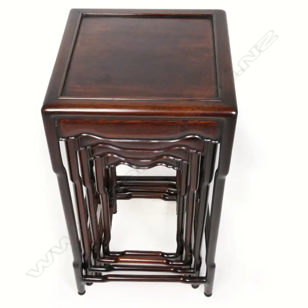 A set of four Chinese rosewood nesting tables, Image 1++